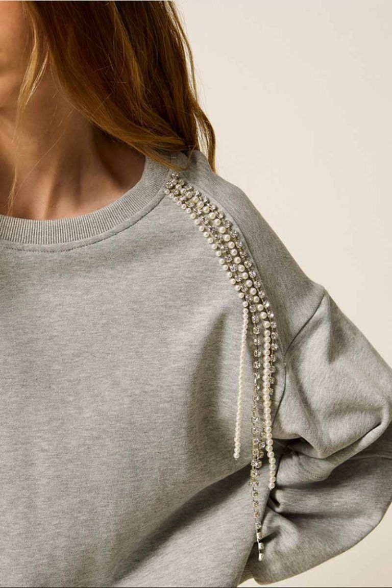 Felpa con catene di strass e perle